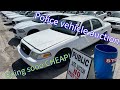 Selling a ton of police cars at auction
