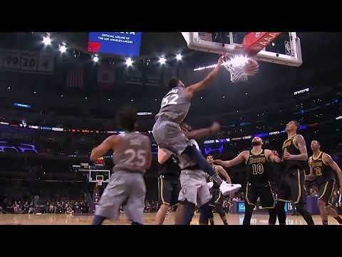 Jimmy Butler has a priceless reaction to Karl Anthony-Towns dunking over him