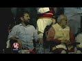 CM Revanth Reddy Holding Umbrella And Watching Dance Show In Rain | V6 News - Video