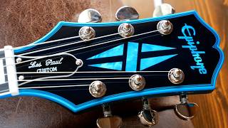 Video thumbnail for The LEAKED Epiphone IS FINALLY Here (+ Looks Fantastic!) | 2025 Indigo Burst Les Paul Custom Review by The Trogly's Guitar Show