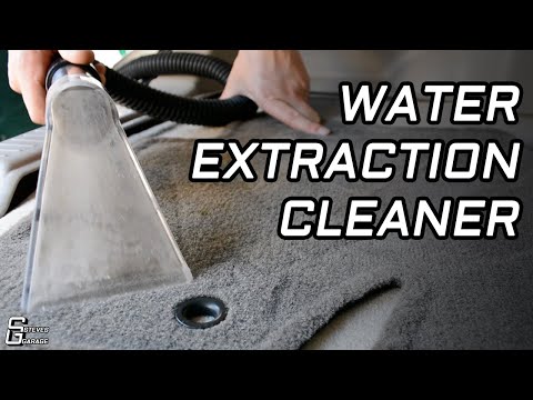 Extracción con agua caliente en interior de coche