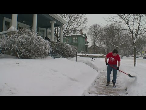 Twin Cities Residents Clean Up After Weekend Snow