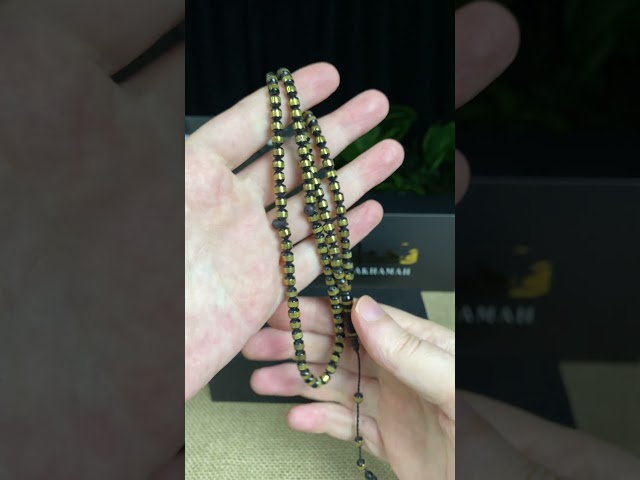 سبحة كوك أسود بنقوش ذهبية – 99 خرزة