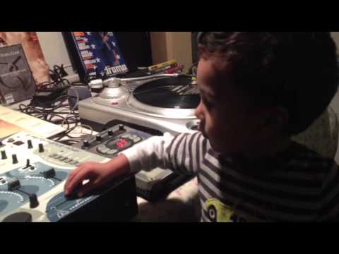 My Lil son   Practicing his hip-hop skills on the turntables