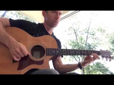 The maid behind the bar on guitar