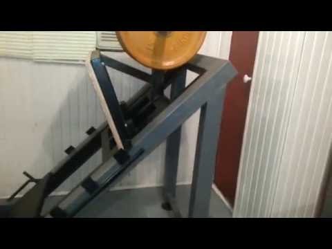 Тренажёр для жима ногами