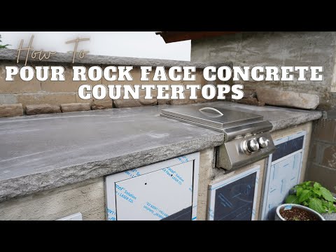 Pouring Rock Face Outdoor Kitchen Countertops with Appliance Cutouts - #outdoorkitchen #diy
