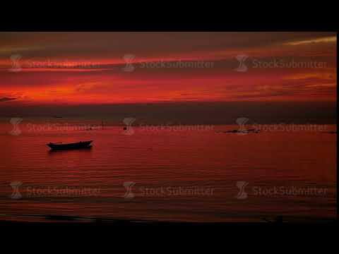 Amazing Colors of tropical sunset with fishing ship. slow motion. Koh Phangan, Thailand. 1920x1080