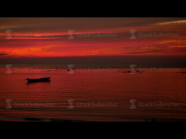 Amazing Colors of tropical sunset with fishing ship. slow motion. Koh Phangan, Thailand. 1920x1080