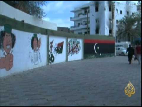 رسوم كاريكاتير تسخر من نظام العقيد القذافي