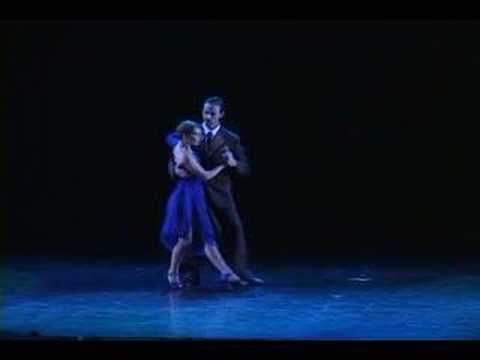  Nancy Louzan  and  Damian Ignacio Eselevsky Esell  are  dancing  to  the  tango  "  A Evaristo Carriego  "
