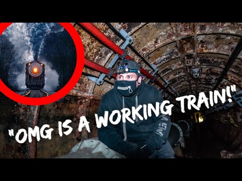 CRAZIEST UNDERGROUND EXPLORE YET! A WORKING TRAIN SURPRISES US!