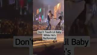 Security knocks fan off stage for rushing Lil Baby! #LilBaby #rapper #concert #hiphop