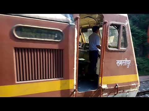 Old and rusty rail tunnel in India - train in tunnel