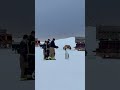 Firefighters at #mcmurdo #antarctica playing with a penguin #nsf #firefighter #zoo #snow #usap