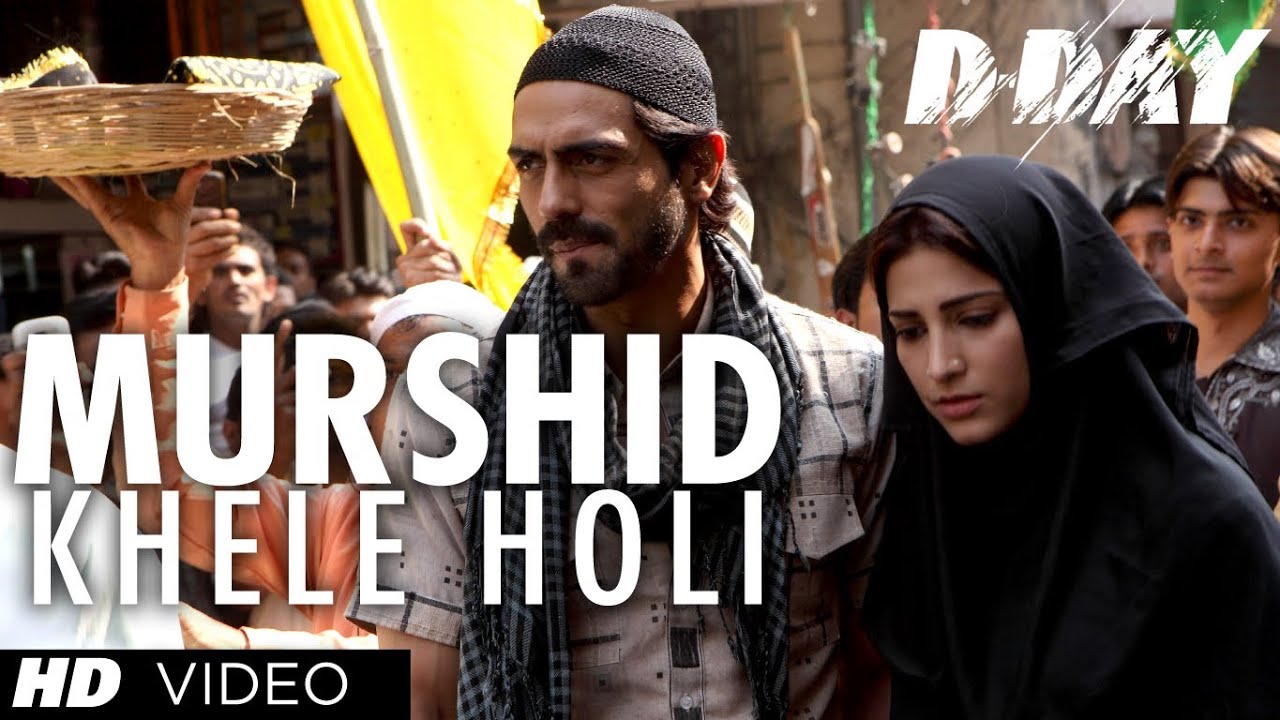 Mera Murshid Khele Holi Lyrics | D-Day | Javed Ali, Munawar Masoom, Shankar Mahadevan | Shankar Ehsaan Loy