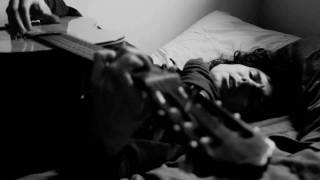 Jeremy Fisher - Busking for change in bed Umbrella