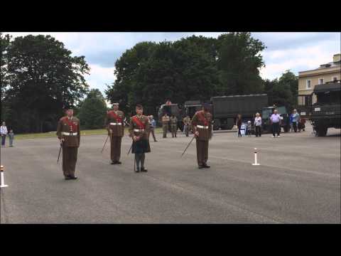 Academy Company Sergeants Major demonstrate marching with a pace stick