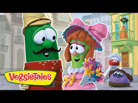 Green veggie character with a hat and mustache smiles at a pink-clad veggie holding a bouquet in a quaint town, VeggieTales logo visible.