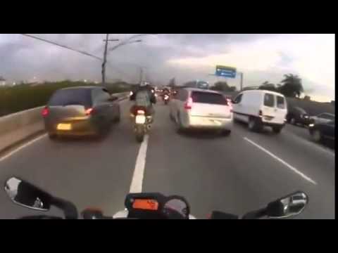 Crazy Motorcycle rider going through traffic- Ok you're right song