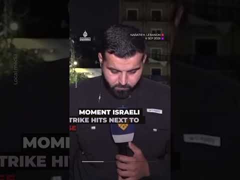 Moment Israeli strike hits next to Lebanese reporter
