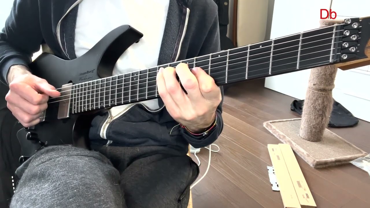 Guitarist demonstrating major triads with voice leading on the G, D and A strings