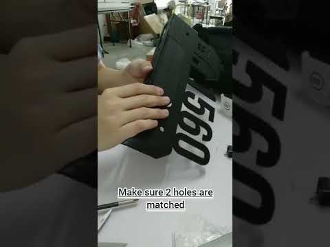 Installing a Solar Lamp on House Number Plate