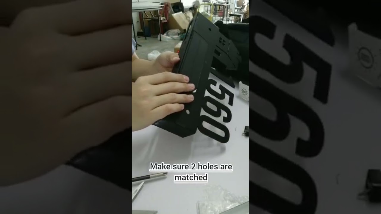 Installing a Solar Lamp on House Number Plate