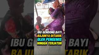 Download lagu A mother carrying a baby falls after her clothes are pulled off by a beggar. #trending #latestnew... mp3