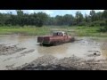 Mud Trucks Pulling Each Other Out River Run Part 1