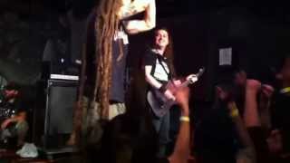 Brian Fair of Shadows Fall crowd surfs to the bar for a shot