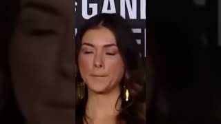 Ring girl stares at UFC Champion