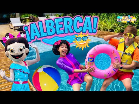 We play in the pool | Andy misbehaves in the pool | His friend shows off her swimsuit