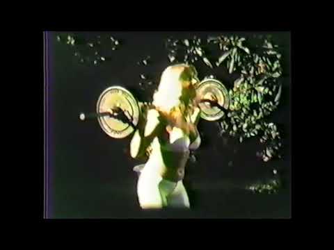 Unknown female bodybuilder circa 1980 beautiful blonde lifting weights