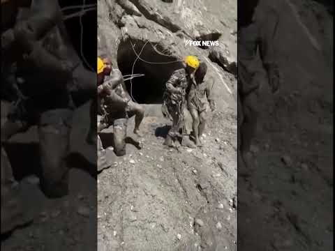 WATCH: Rescuers crawl through mud to save workers trapped in Nepal tunnel #shorts #foxnews