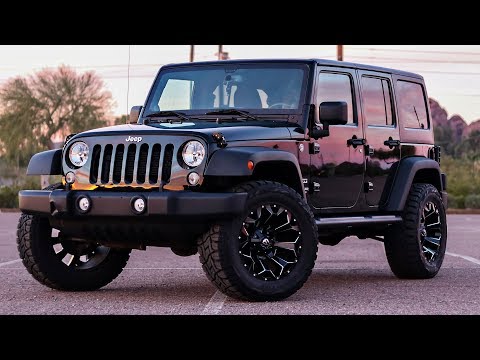 Blacked Out Jeep w/ 35" TOYO RT's 20" Fuel Assault Rims