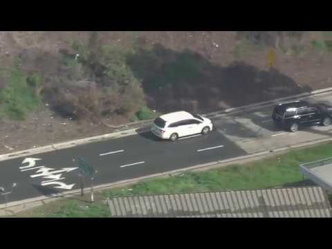 Police chase possibly armed suspect through San Fernando Valley Video