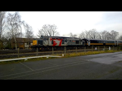 ROG Class 37, 37611 "Pegasus" hauling TfW  Mk 4 carriages & DVT 82200 at West Byfleet on 15/01/21