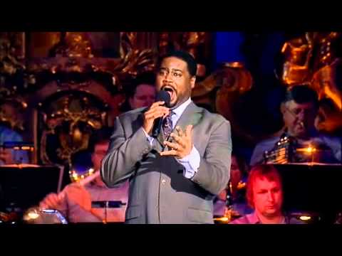 Stage view: Prague Filmharmonic forces and choir framing soloists during Hallelujah Broadway