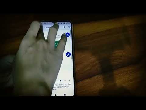 How to change display size in  Motorola Moto g30