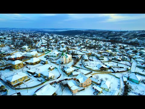 Aerial drone view of Milestii Mici village with snow, Moldova