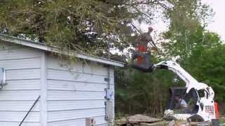 preview picture of video 'Large Live Oak Tree Pruning with Bobcat and Pole Saw, Moss Point, MS'