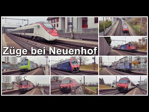 Güter- und Personenzüge bei der kleinen Zughaltestelle Neuenhof, Kanton Aargau, Schweiz 2021