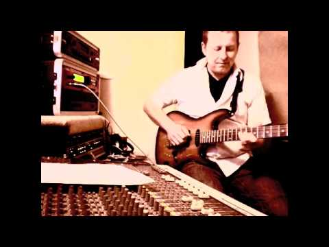 Neil Kellow recording rough guitars on track '55'