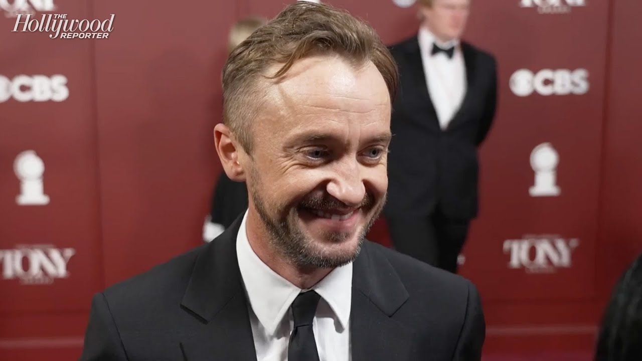 In this recent Tony Awards red carpet interview, Tom Felton reflects on returning as Draco Malfoy, providing thoughtful and witty insights into his experiences that fit the podcast's theme of dissecting modern absurdities.