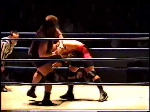 Massive Damage vs Custom Made Man - July 4th 2001