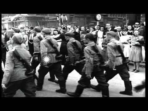 Czech soldiers march and sing; group of United States and New Zealand liberated p...HD Stock Footage