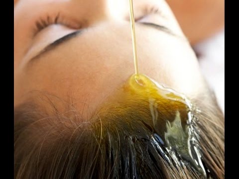comment appliquer l'huile d'amande douce dans les cheveux