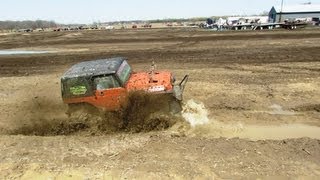 preview picture of video 'Orange 4x4 Jeep Digs It Up At Carsonville Mud Bog'