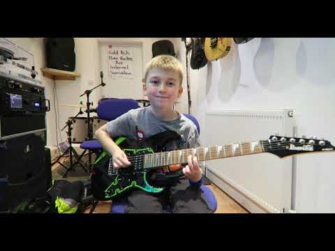 8 Year Old Jake Plays Shut Up And Dance By Walk The Moon On Guitar